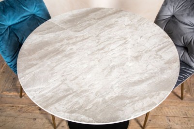 dark marble round table velvet chairs